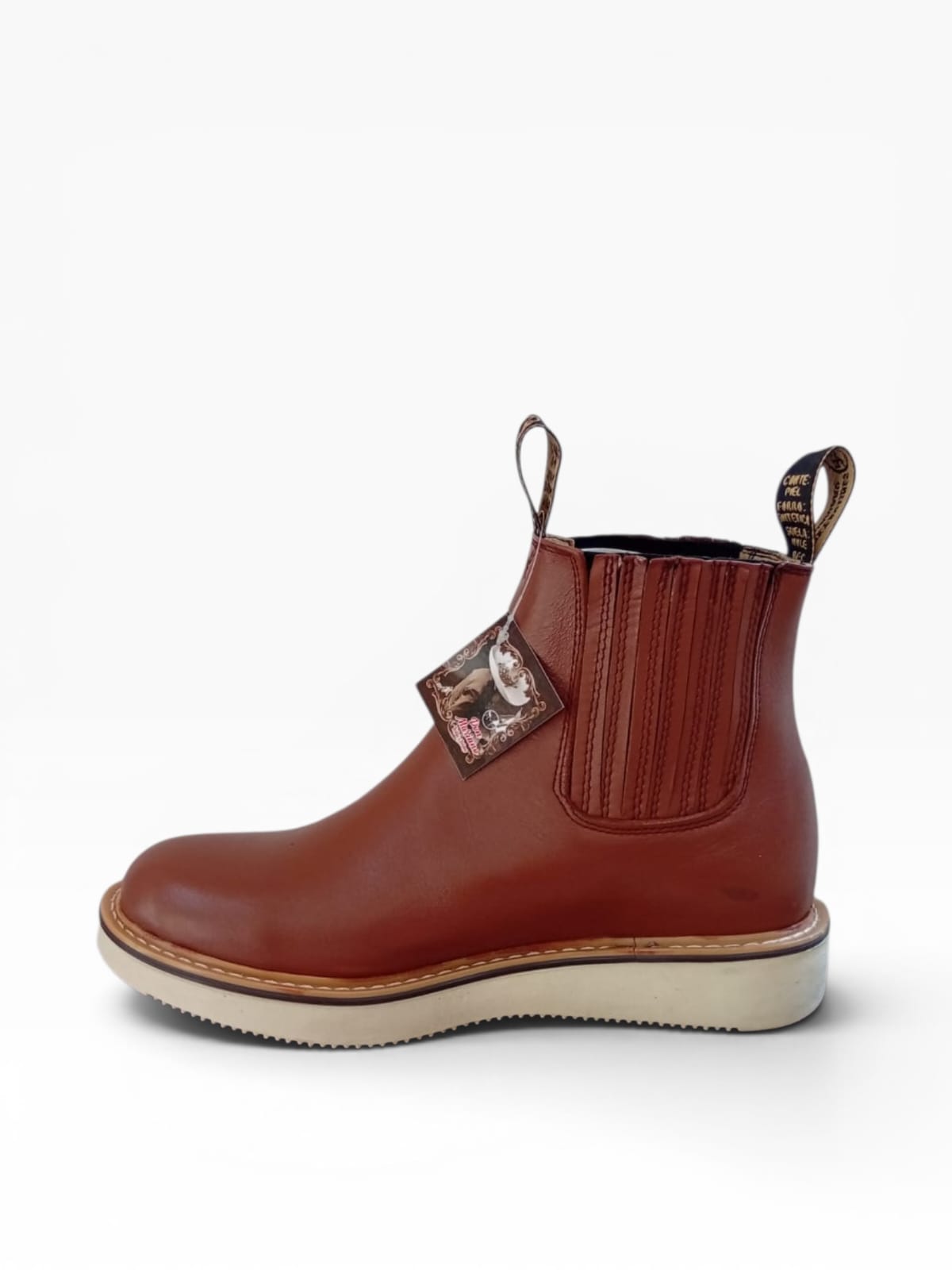 Botines lecheros con suela mil rayas marca Don Mariano
